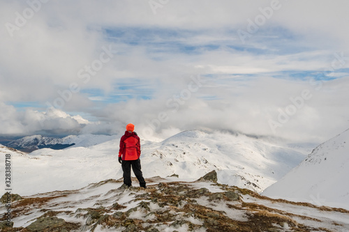 Woman Looking at View of Mountains