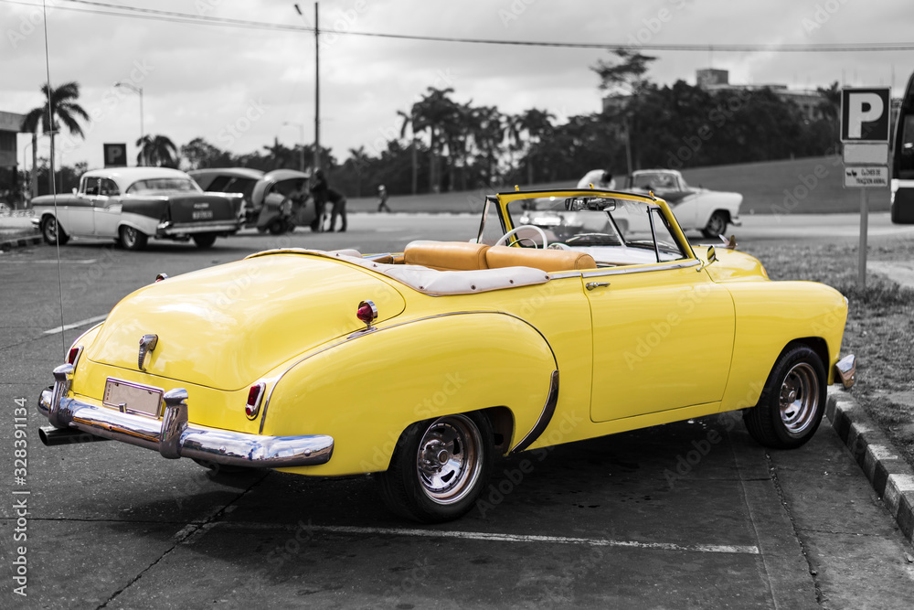 colorkey of old yellow american convertible classic car in havana cuba