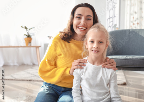 Young woman and her little ...