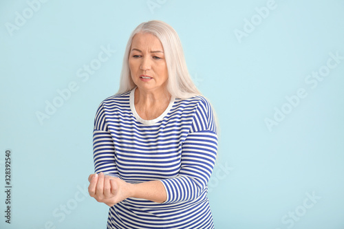 Senior woman suffering from...