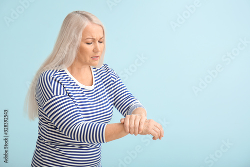 Senior woman suffering from...