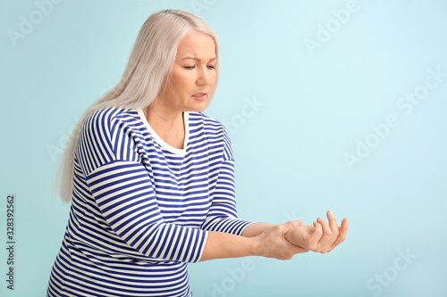 Senior woman suffering from...
