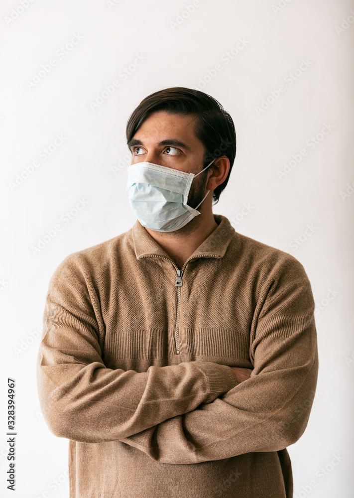 Virus: Man Looks To Side While Wearng Surgical Mask Virus: Man Looks To Side While Wearng Surgical Mask