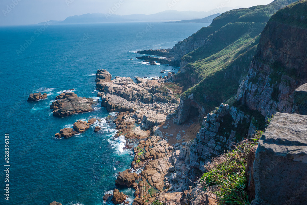 Longdong Bay Cape (dragon caves) is located along rugged coastal terrain in Taiwan, and was formed by tectonic movements by sedimentary rocks that are over 30 million years old.