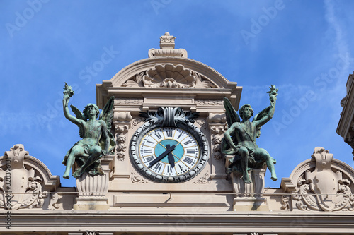 Obraz na płótnie Clock With Bronze Sculptures Of Angels In Monaco