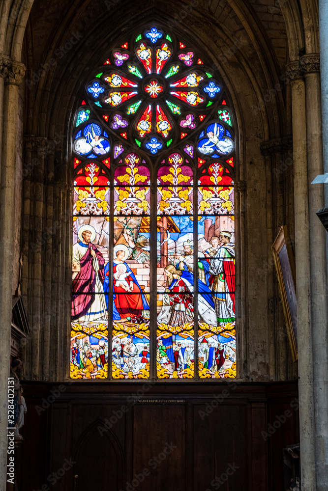 Tours, France - 02/20/20 : Religious Stained glass. Tours's cathedral. Cathedral Saint Gatien'interior. Inside the cathedral with vibrant colors. 