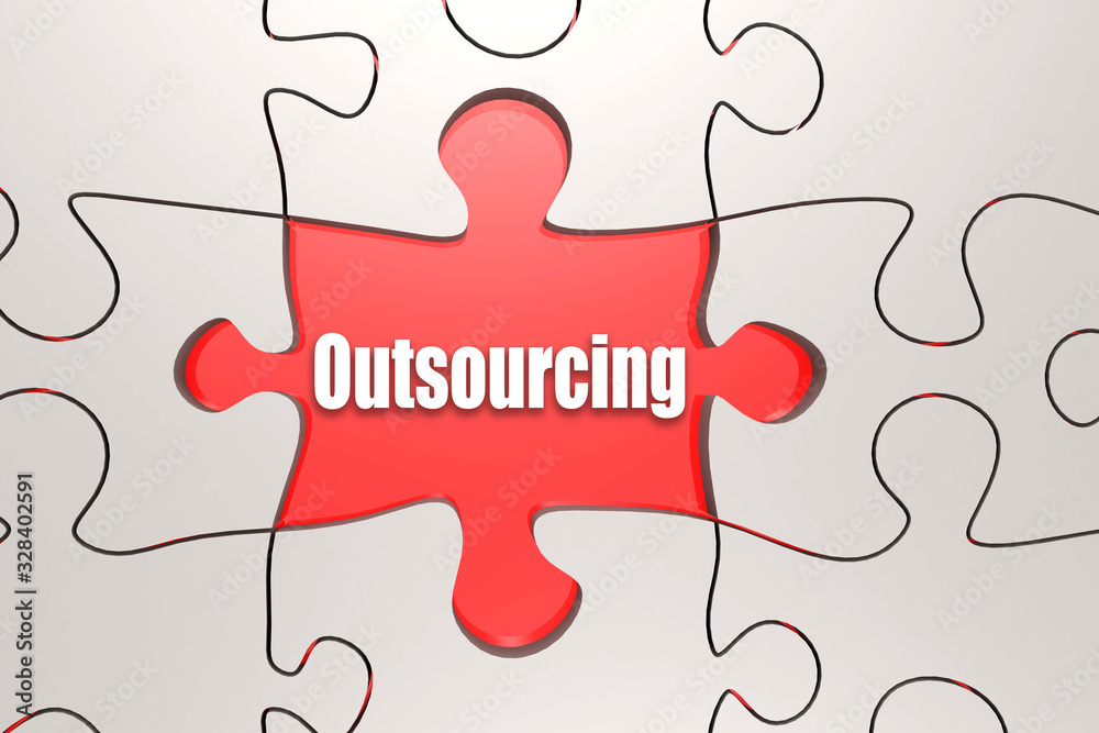 Fototapeta premium Outsourcing word on jigsaw puzzle