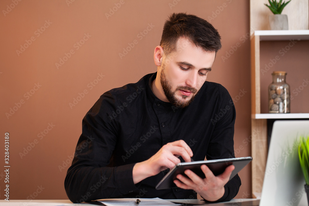 Employee working on a tablet in the office