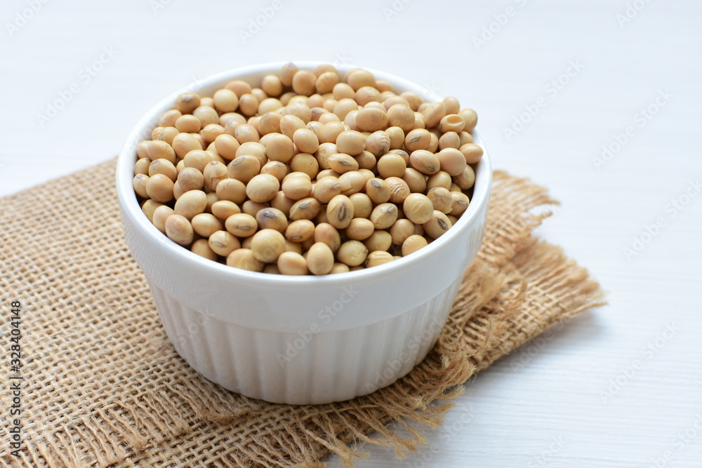 Raw soybeans (Glycine max) displayed in containers Raw soybeans (Glycine max) displayed in containers