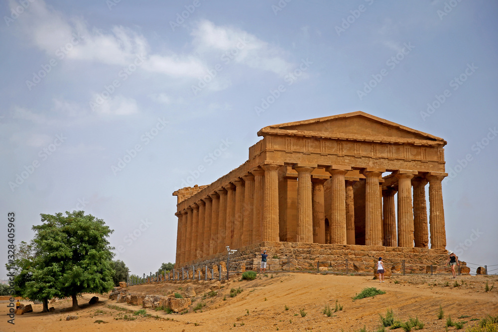 The Temple of Concordia, a 5th-century BC, Doric-style Ancient Greek temple in the Valley of the Temples, a UNESCO World Heritage Site in Agrigento, Sicily, Italy .