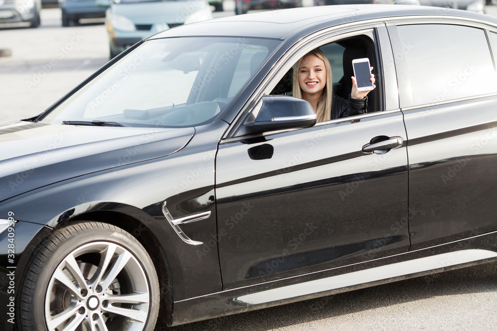 Young happy woman bought new modern car Young happy woman bought new modern car