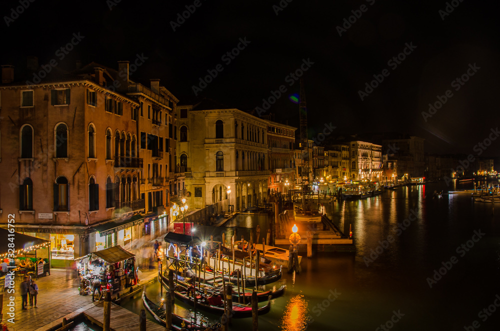 Venice, Italy May 18, 2015: Grand Canal and docked boats alongside houses in Venice Italy