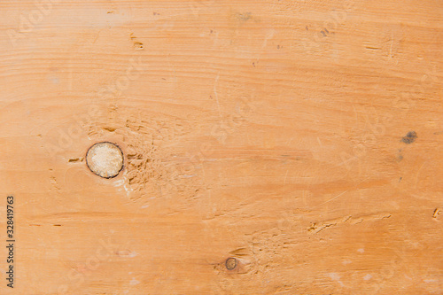 Wood texture on a plank with a circle