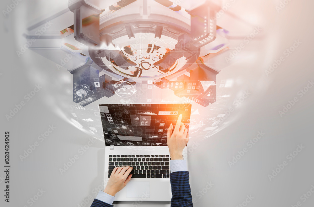 Businesswoman hands on laptop on tech background. Mixed media Businesswoman hands on laptop on tech background. Mixed media