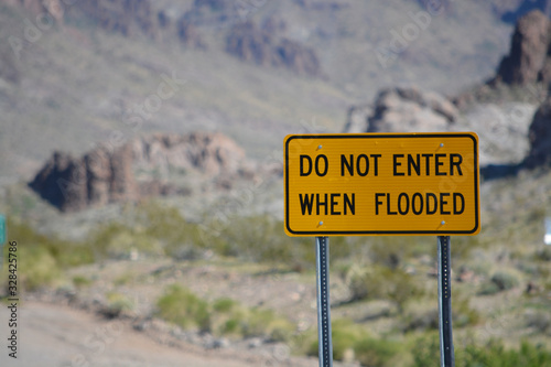 Do Not Enter When Flooded Sign on Route 66 in Mohave County, Arizona USA