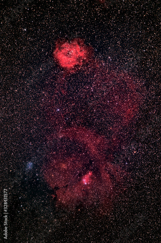 Wide-Field Of The Rosette Nebula NGC 2244 (also known as Caldwell 49) in the dark night sky