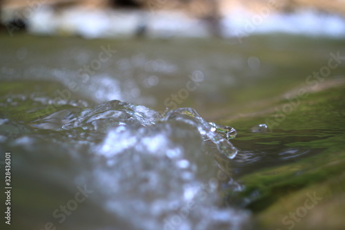 The image of a mountain stream with clean water.