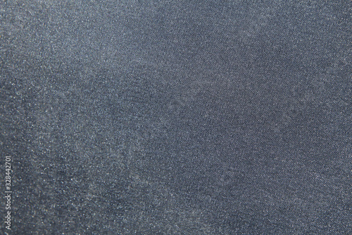 Gray shiny fabric material in zoom.