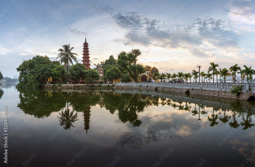 Tran Quoc pagoda during sunset time, the oldest temple in Hanoi, Vietnam. Hanoi cityscape.