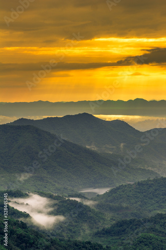 Natural background,high angle that overlooks blurred scenery from fog, rain that flows through,sees Buddha images,temples,mountains,is a viewpoint while traveling in Phetchabun,Khao Kho,Thailand