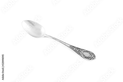 Clean shiny metal spoon isolated on white