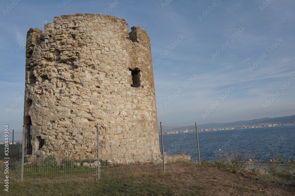 Old stone wall of an ancient tower