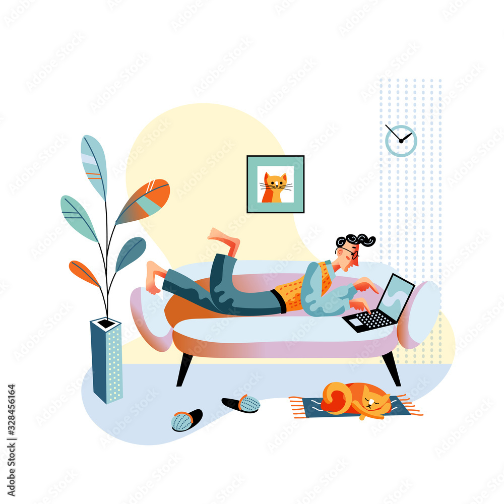 Obraz premium Man lying on sofa and typing on laptop keyboard