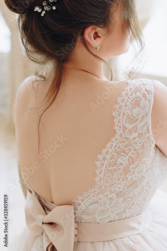 details of the bride in the wedding dress