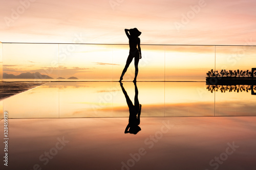 Cowboy Hat girl on an infinity pool in Brazil