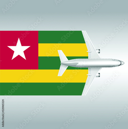 Plane and flag of Togo. Travel concept for design