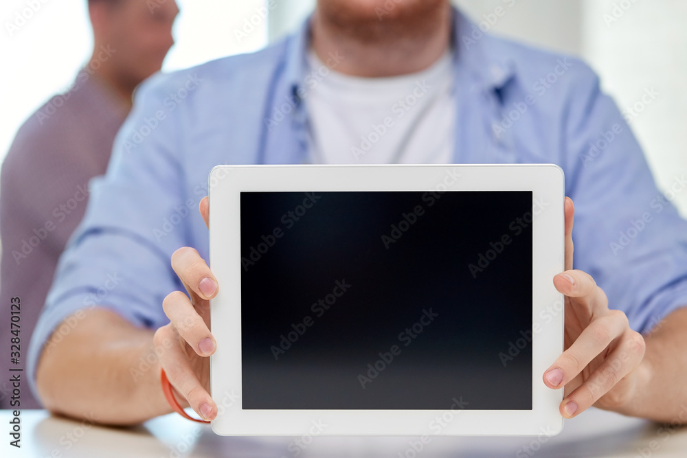 education, technology and people concept - close up of man with tablet pc computer