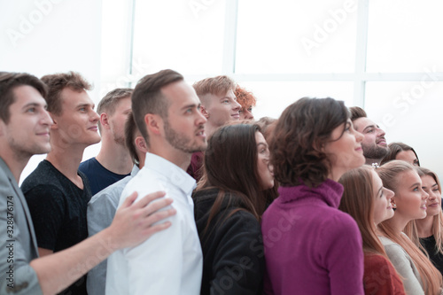 group of successful young people looking forward