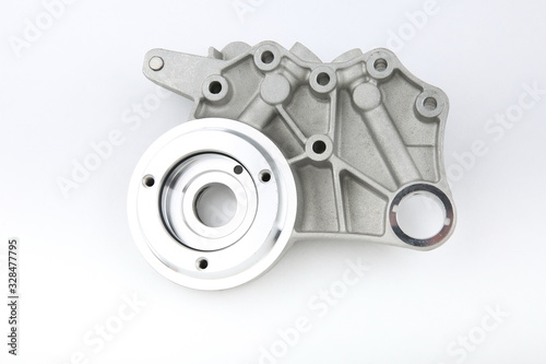aluminium car engine part on white background top view 