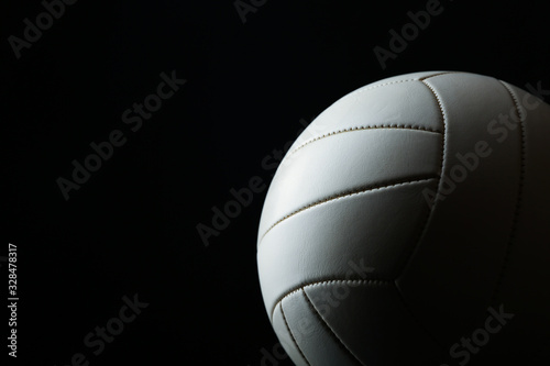 ball with shadow on black background with copy space