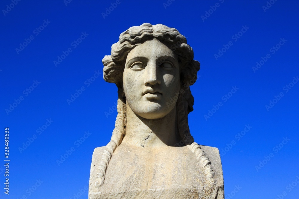 Close up of marble statue on the arena of Panathenaic stadium in Athens, Greece