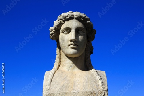 Close up of marble statue on the arena of Panathenaic stadium in Athens, Greece