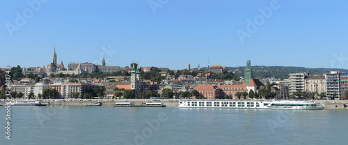 Budapest, Hungary, 15th September 2019. - View of the Budim from Pest. The Fisherman`s Bastion, the Matthias Church and Protestant church and Danube river