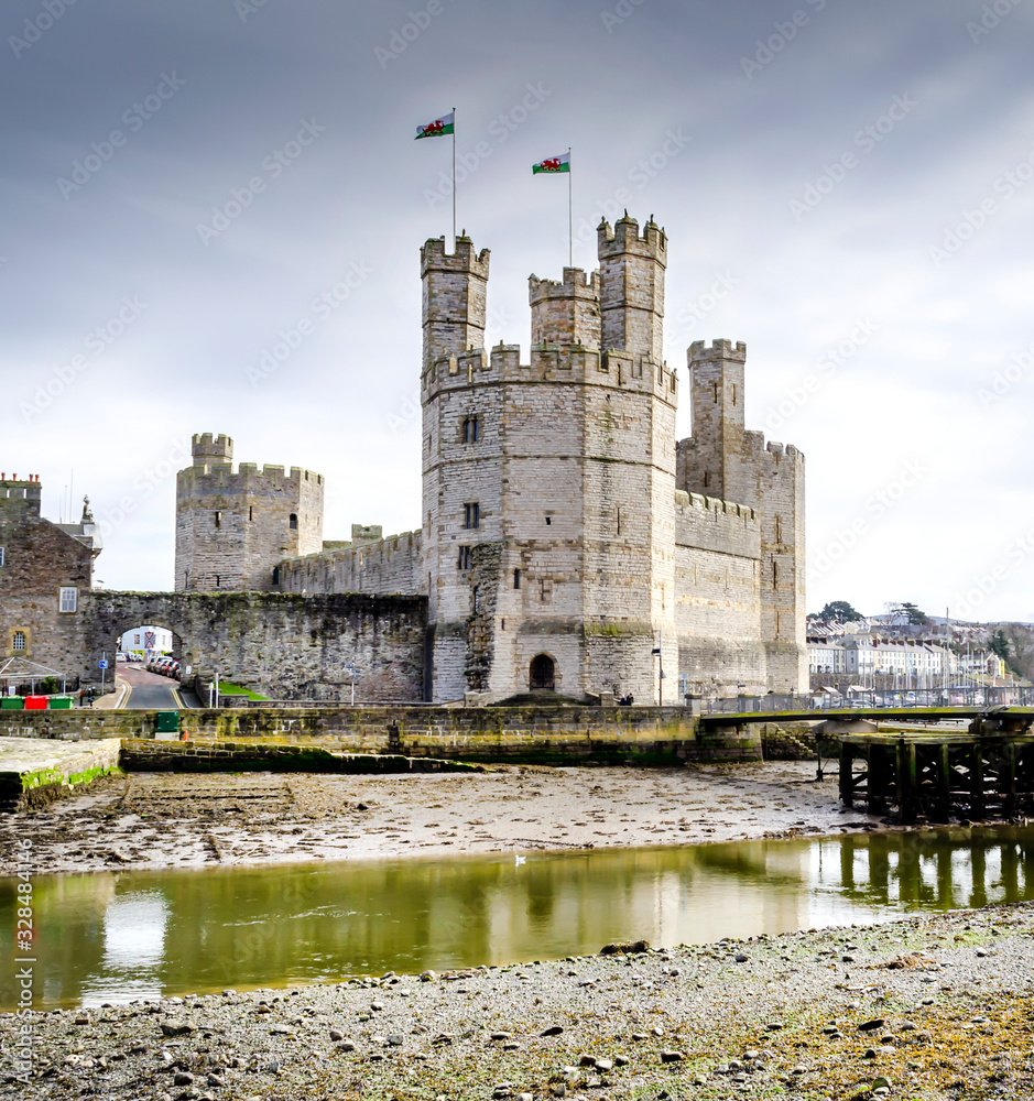Caernarfon Castle  North Wales on the banks of the river Selont is a World Heritage site. .