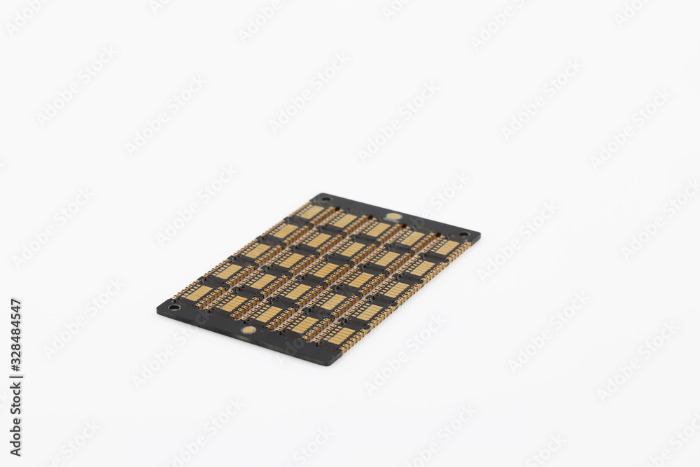 Multiplied printed circuit boards PCB isolated on the white background. PCB assembly. Multiplied printed circuit boards PCB isolated on the white background. PCB assembly.