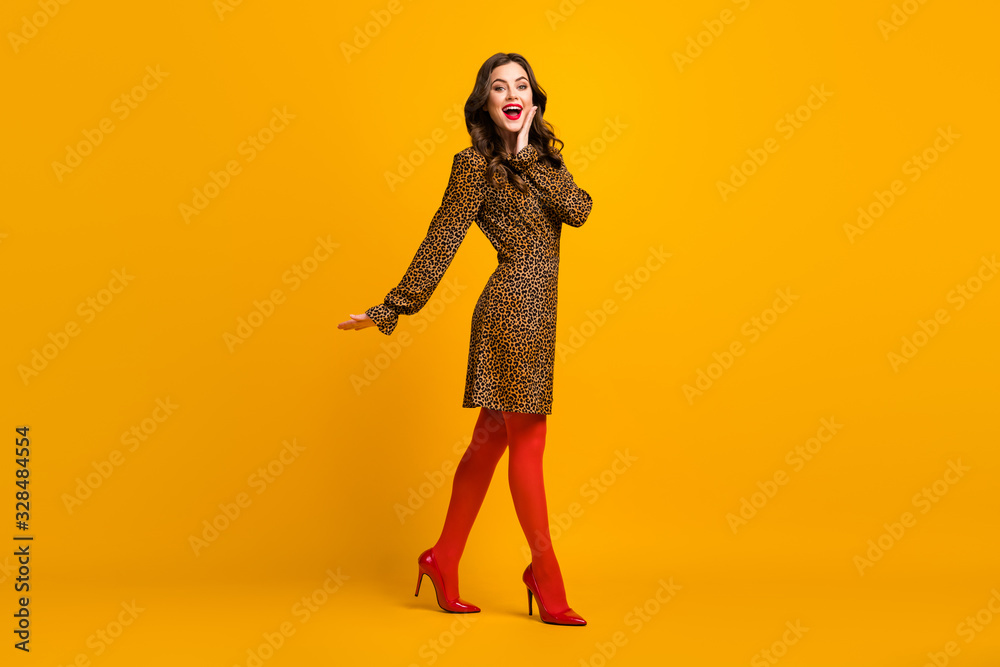 Full length body size view of her she nice-looking rich attractive lovely luxurious glad amazed cheerful cheery wavy-haired girl going isolated over bright vivid shine vibrant yellow color background Full length body size view of her she nice-looking rich attractive lovely luxurious glad amazed cheerful cheery wavy-haired girl going isolated over bright vivid shine vibrant yellow color background