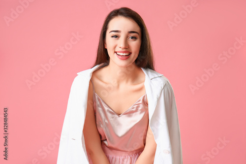 Stylish young woman on colo...