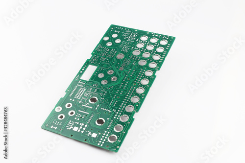 Multiplied printed circuit boards PCB isolated on the white background. PCB assembly.