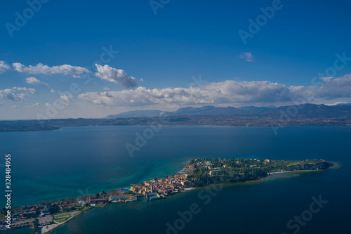 Fototapeta Naklejka Na Ścianę i Meble -  Sirmione town, Lake Garda, Italy. Aerial view of Sirmione high altitude.