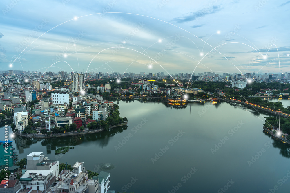Naklejka premium Smart city and wireless communication network concept. Digital network connection lines of Hanoi city at West Lake or Ho Tay