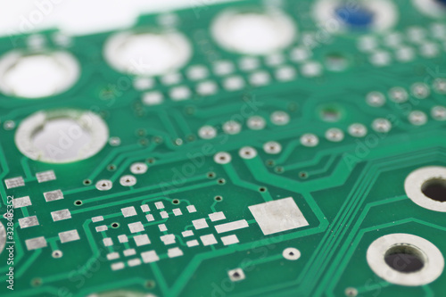 Multiplied printed circuit boards PCB isolated on the white background. PCB assembly. Close-up view