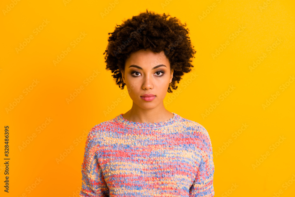 Portrait of concentrated afro american girl look in camera true freelance worker wear casual style outfit jumper isolated over bright color background Portrait of concentrated afro american girl look in camera true freelance worker wear casual style outfit jumper isolated over bright color background