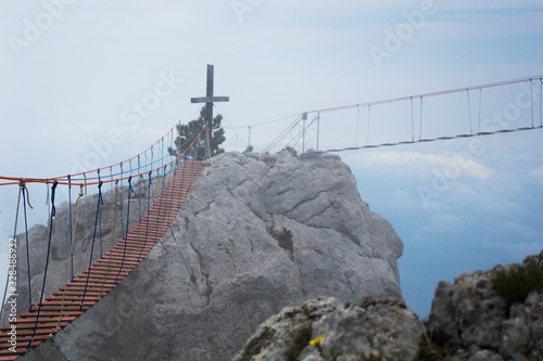 Rope bridge in the clouds.Tourist route to the top of the mountain.  Crimea. Ai-Petri