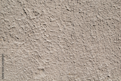 Background. Gray grunge textured wall. Stucco drops