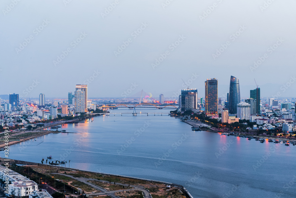 Da Nang city skyline cityscape at Han river at twilight in Da Nang, central Vietnam