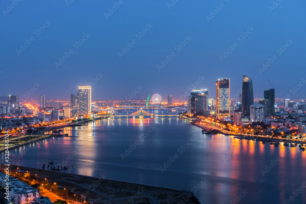 Da Nang city skyline cityscape at Han river at twilight in Da Nang, central Vietnam